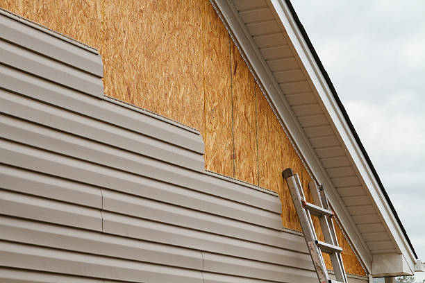 Professional Vinyl Siding technician working in Boonville, NC